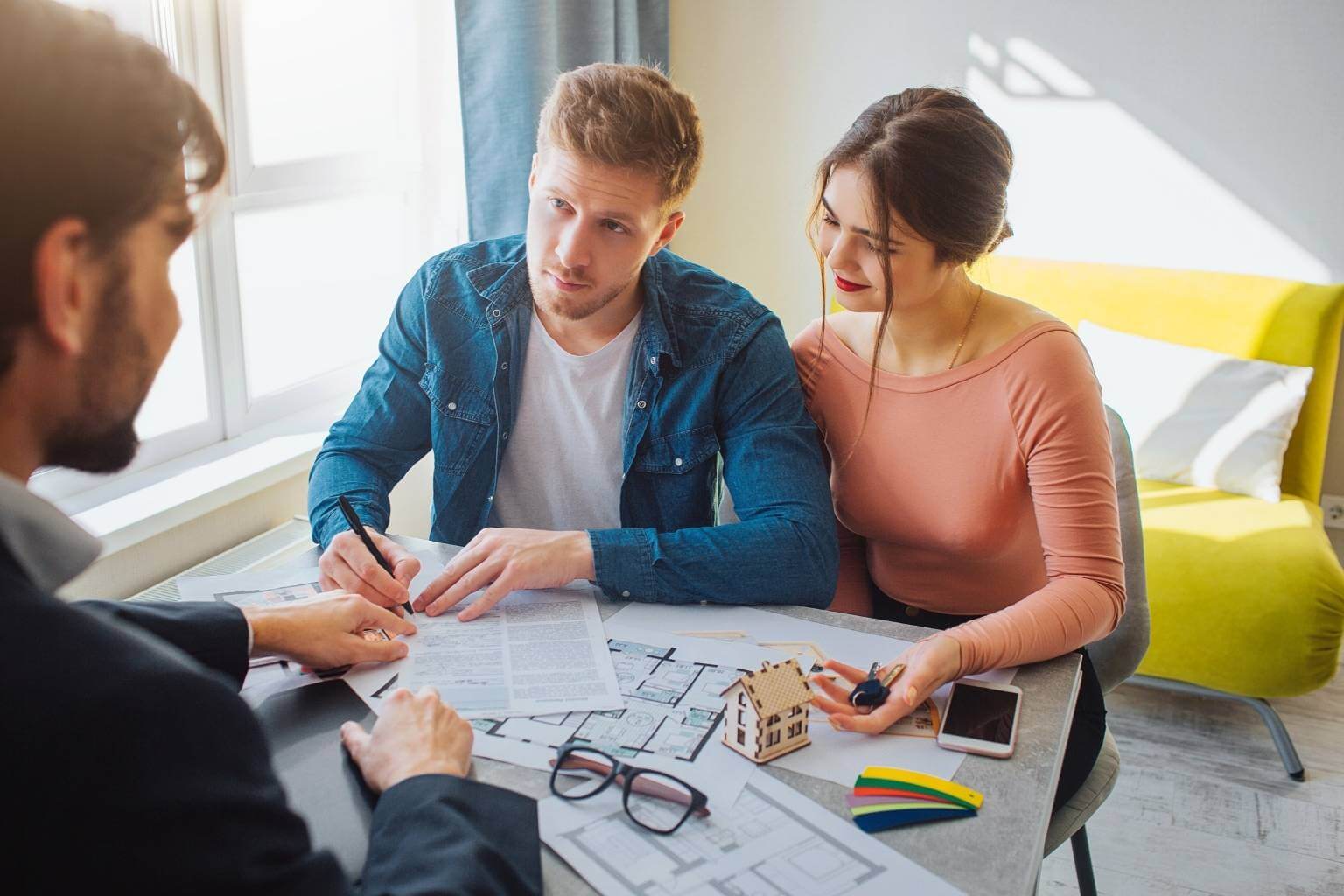 Homebuyers reviewing appraisal paperwork