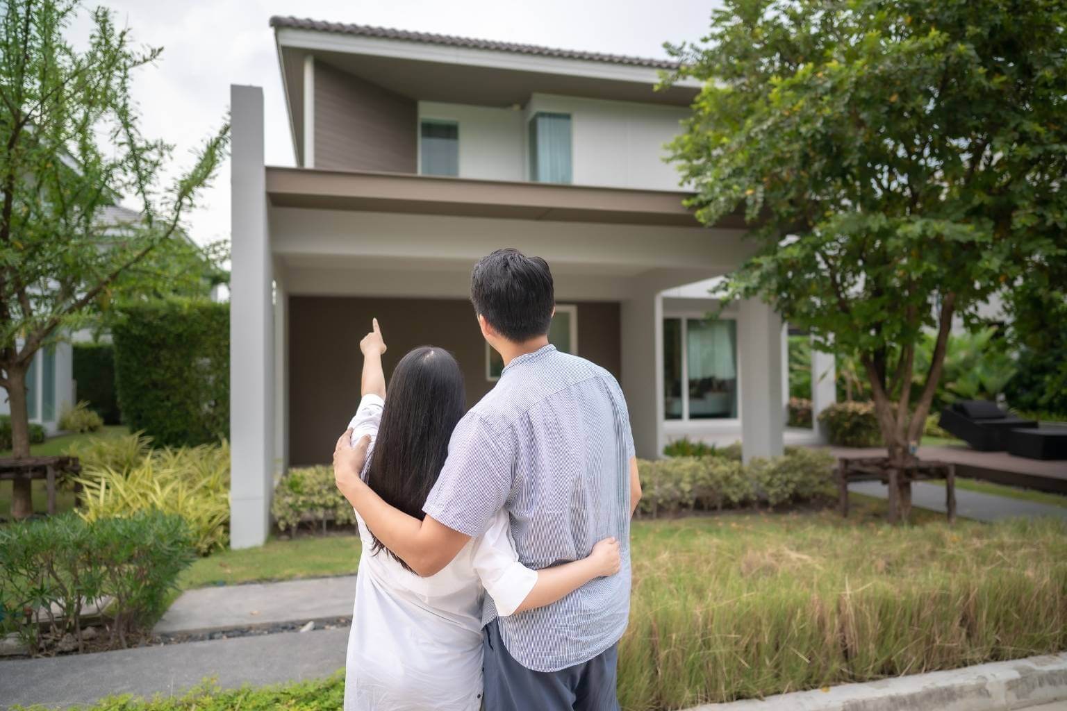 couple looking at new house together