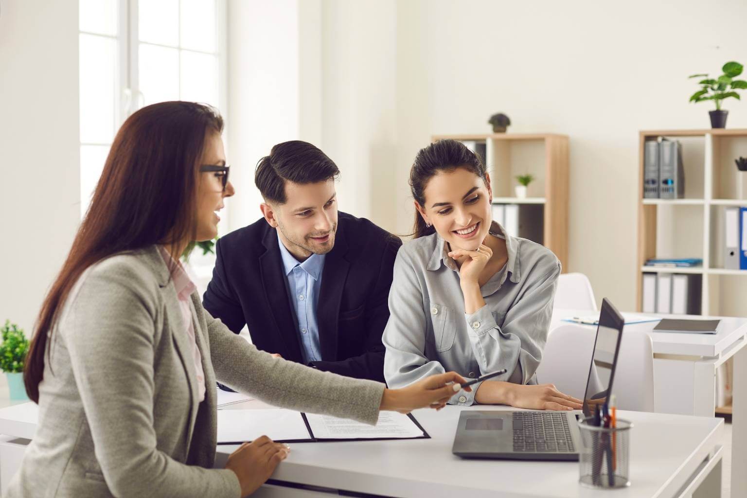 clients discussing loan options with mortgage broker