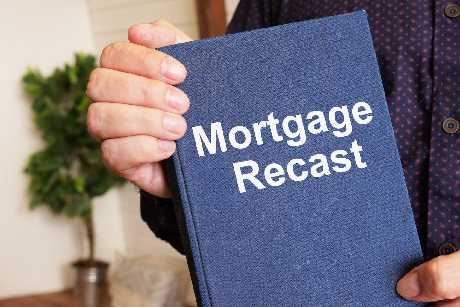 person holding mortgage recast folder