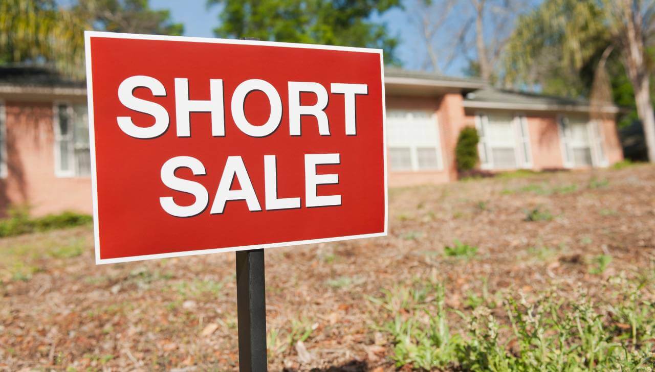 short sale sign in yard